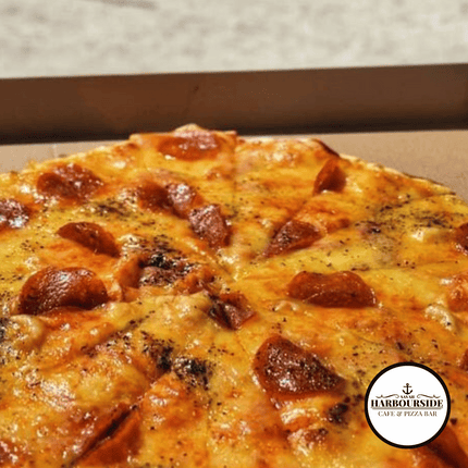 Pepperoni Pizza "PICK UP AT SAVAII HARBOURSIDE CAFE & PIZZA BAR SALELOLOGA, SAVAII"